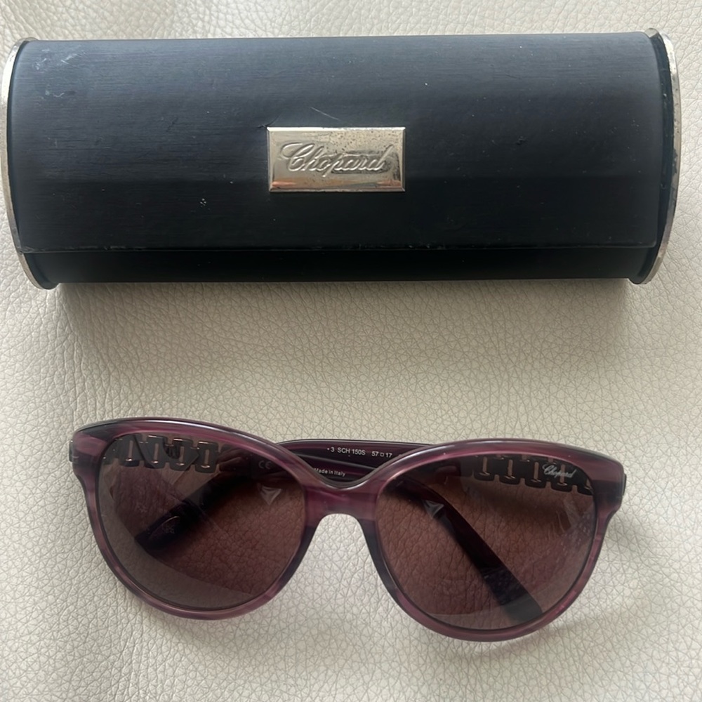 Chopped purple sunglasses with 💎 gemstones on side. Case included